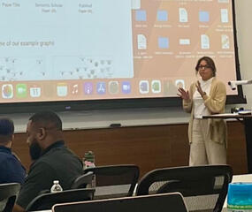 LEAD BY EXAMPLE, ENSURING I KEEP UP WITH RESEARCH AND TECHNOLOGY TO MAKE RESPONSIBLE DECISIONS USING EFFICIENT PRACTICES AND TOOLS. PICTURE INCLUDES PRESENTATIONS TO DOCTORAL STUDENTS ON AI TOOLS FOR RESEARCH.